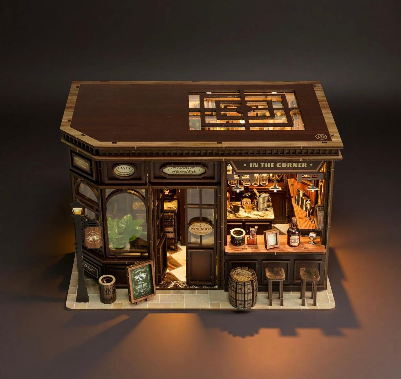 Himax Corner Tavern miniature house kit glowing with warm LED light